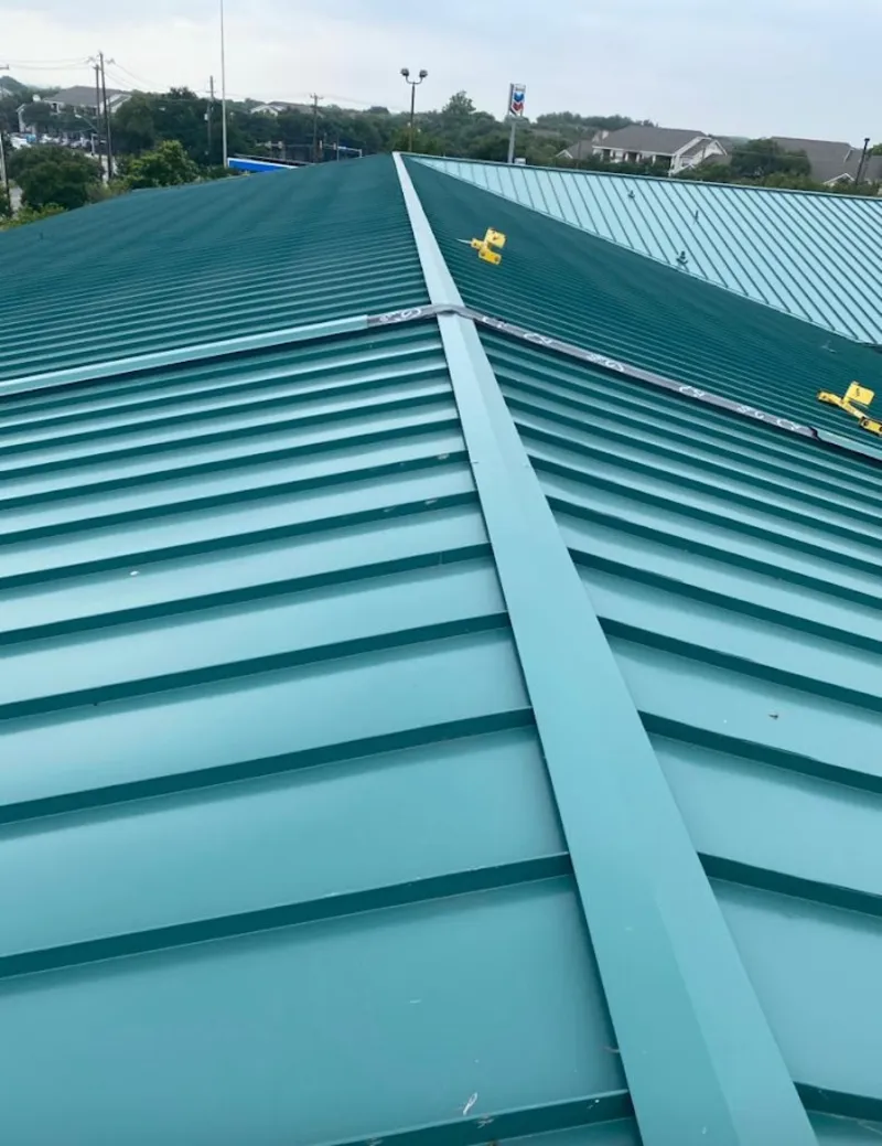 Green commercial metal roof ridge and valley for Metal Roof Repair in College