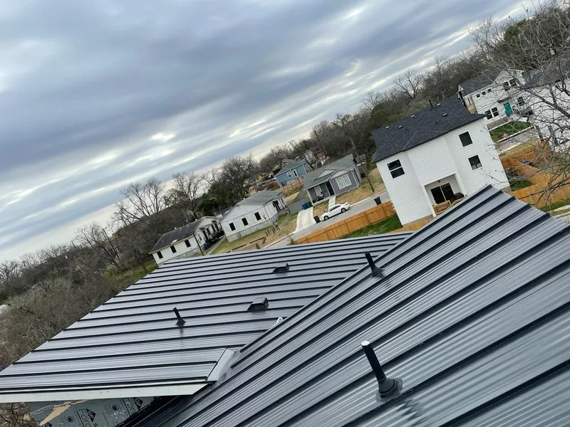 Standing seam metal roof panels with vents for Skylight Repair in College